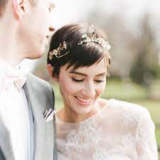 Pull your curls back into an updo and tuck some flowers behind your hair for sweet short hair wedding updos. 24 Wedding Hairstyles For Short Hair