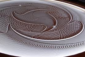 Sisyphus Table Uses A Small Ball To Draw Designs In The Sand