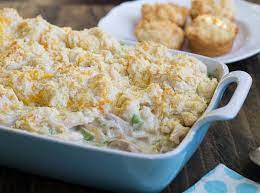 In a large bowl, combine the noodles, chicken, soup, milk, cheese, peas and carrots, garlic powder, onion powder and salt and pepper to taste. Paula Deen Copycat Chicken Cobbler Chicken Recipes Casserole Easy Casserole Recipes Spicy Recipes