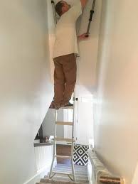 Things to consider before buying a staircase ladder How To Paint High Walls On Stairs A Turtle S Life For Me