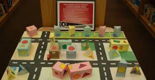 4th Grade Completes Polyhedra Ville Project In Math Students Were Asked To Design A City Of The Future Students Needed Math Projects Math City Math Geometry