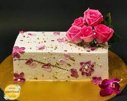 Buttercream flowers sheet cake on the tiered cake. Baker S Hub Voguish Rectangle Cake With Floral Facebook