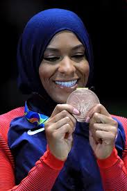 Hijab-wearing Olympian inspires high school girls to fence