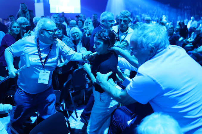 Activists attacked at Reform conference demand apology from Robert Jenrick