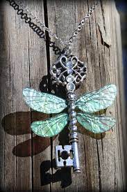 This Detailed Necklace Was Inspired By The Flying Keys That Harry Hermione And Ron Encounte Flying Keys Harry Potter Dragonfly Wall Art Harry Potter Christmas