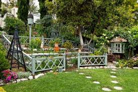 Garden Beauty On A Budget Terraced Vegetable Garden Fenced Vegetable Garden Hillside Garden