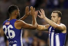 Lachie neale of the lions is tackled by luke mcdonald of the kangaroos during the 2019 afl round 02 match between the north melbourne kangaroos and the brisbane lions at marvel stadium on march 31, 2019 in melbourne, australia. The Roar