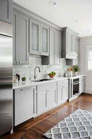 Grey And White Kitchen With Geometric White Backslash Tile Shaker Style Kitchen Cabinets Kitchen Cabinet Styles Kitchen Design