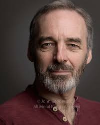 Headshot of actor, Alan McHugh.