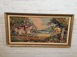 The definition of a tapestry is a large piece of material woven or printed with something felt to resemble a richly and complexly designed cloth. Tapestry Of A Hunting Scene Wall Decoration Inventory Glantiques