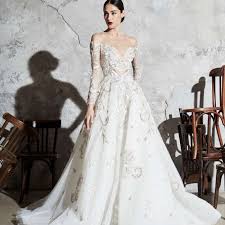 This model's blush pink wedding dress was breathtaking, but did you see her epic cape? Zuhair Murad Wedding Dresses By Season