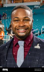 NFL Network reporter Cameron Wolfe smiles