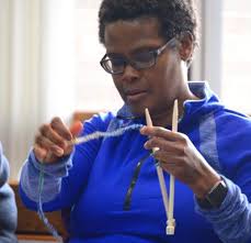 Tight-knit community: Hats, scarves made for domestic violence victims