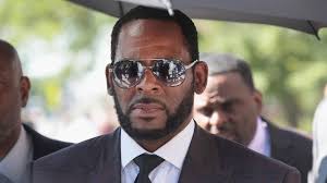 R. Kelly: Singer pleads not guilty to updated sex abuse charges - BBC News