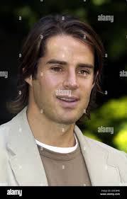 Jamie redknapp red hi-res stock photography and images