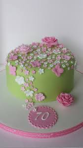 Lemon and elderflower cake with fresh flowers and gold leaf. Floral Cake For 70th Birthday 70th Birthday Cake Floral Cake Colorful Cakes