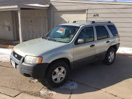 Image result for Gold Ash 2003 Escape