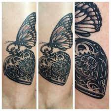 My Favorite Tattoo I Worked On Heart Locket And Butterfly Tattoo Heart Locket Tattoo Butterfly Tattoo Tattoos