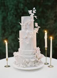 A traditional wedding cake is usually a white vanilla cake in towering stacked layers. Wedding Cakes Toppers Martha Stewart