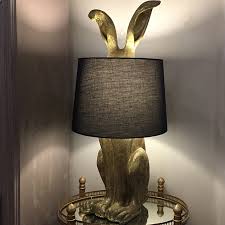 For a modern vibe, our industrial table lamps in metal are a stylish choice. Antique Gold Rabbit Table Lamp