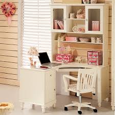 It has space for you to display your books, makeup and a tv. Corner Study Table Design Novocom Top