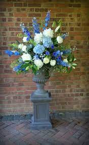 Beautiful Delphiniums Hydrangea And Cornflowers Create A Lovely Blue Summer Weddi Large Flower Arrangements White Flower Arrangements Blue Flower Arrangements
