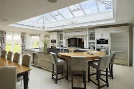 Upscale kitchen with breakfast bar. How To Design A Kitchen To Include A Dining Space Davonport