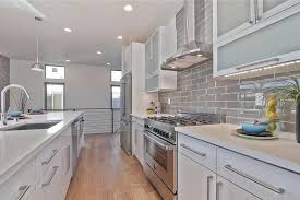 C shaped modular kitchen black white kitchen. Acrylic Glossy White Icraftkitchen
