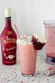 Pour bailey's red velvet liqueur into hot chocolate; Boozy Red Velvet Milkshakes Are Irresistibly Decandant And Creamy Filly Of Flavor Thanks To The Red Boozy Milkshake Recipes Baileys Recipes Homemade Milkshake