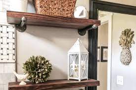 Not a pipe shelf below, but a waaaaaay cool lamp with an edison bulb! Plumbing Pipe Floating Shelves Simple Diy Project Simply2moms