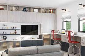 This layout features living room furniture pulled off the walls and arranged closer to the fireplace for a cozy feeling. Den And Family Room Ideas Loveproperty Com