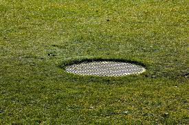 How to cover drain in backyard. How To Maintain A Yard Drain And Prevent Clogs