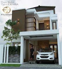 Model fasad berciri modern tropis, sesuai iklim & kultur budaya indonesia, begitulah hasil konsep karya desain jasa arsitek kami, simpel & elegan, proporsional tidak berlebih dalam detail & model, sesuai reques klien, desain fasad kami visualisasikan dengan hasil render halus yang mendekati bentuk sebenarnya setelah terealisasi/ terbangun. Tropis Modern Rumah Tropis Desain Rumah Rumah Indah