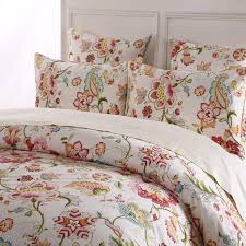 A white and blue paisley print daybed sits on a moroccan rug and is styled with pink and gray pillows placed on light gray bedding. Pottery Barn Valencia Paisley Duvet Cover Full Queen Two Standard Shams Duvet Cover Sets