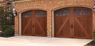 Warm wood garage doors on a home constructed of mostly glass and steel are the perfect stylistic juxtaposition. Glenmoor Garage Door Collection Wood Look Without The Wood Price