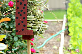 Cut the bottom portion off of one milk jug. The Cutest Stinkin Ladybug Hotel Diy Pink Fortitude Llc