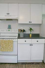 This diy is perfect for renters looking to make their kitchen less dated and more like their own without permanently changing anything. Apartment Kitchen Makeover Using Rustoleum Cabinet Transformations Kit Diy Kitchen Cabinets Painting Cabinet Transformations Painting Kitchen Cabinets