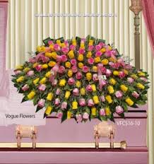 Lovely All Pink And Yellow Roses Sympathy Casket Spray In Williston Park Ny Vogue Flowers