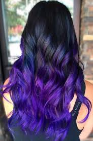 This color option involves coloring the underneath layer of your hair with a purple hair dye. Deep Purple Black Hair With Purple Tint