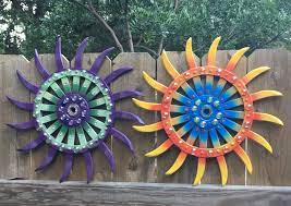 I Love Making These Metal Flowers For My Garden From Old Rotary Hoe Tiller Wheels Rotaryhoetiller Metalflow Metal Yard Art Wheel Crafts Metal Flowers Garden