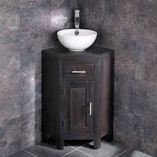 Bathroom vanity units, also referred to as sink vanity units are essential for creating a stylish modern bathroom. Alta Wenge Oak Corner Vanity Unit 300mm Stabia Round Sink