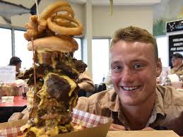 Isaac Harding-Davis devours 1.5kg monster burger in under 5 minutes