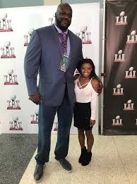 How tall is considered midget? at the moment, 07.04.2020, we have next information/answer: Simone Biles 4 8 With Shaq 7 1 Tall