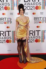 This evening we celebrated an incredible show, uplifting the very best of british and international talent over the past year and coldplay opened the big night with an exclusive performance of their new single 'higher power', dua lipa then delivered an incredible medley of her. Dua Lipa Wore Garters On The Red Carpet