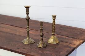 Brass candle holders are safe, beautiful and so unique. Leland Brass Candle Holders Sugar Creek Event Rentals