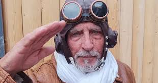 Daredevil great grandad, 81, wing-walks for cancer care charity