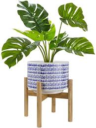 Newest oldest price ascending price descending relevance. Amazon Com Large Ceramic Plant Pot With Stand 9 4 Inch Modern Cylinder Indoor Planter With Drainage Hole For Snake Plants Fiddle Fig Tree Artificial Plants Blue White Home Kitchen