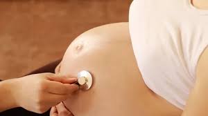 I had trouble hearing it at first, but dh found the heartbeat with the stethoscope. The Doctor With Stethoscope Listening To Stock Video Pond5