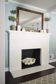 If you want to create a plain look of your fireplace, a great choice would be the ceramic tiles. Fireplace Makeover Planning Buying Materials Young House Love