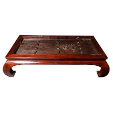 Antique nest of wooden and brass glass topped map atlas nest of campaign tables. Chinese Glass Top Coffee Table Fashioned From An Antique 19th Century Door At 1stdibs